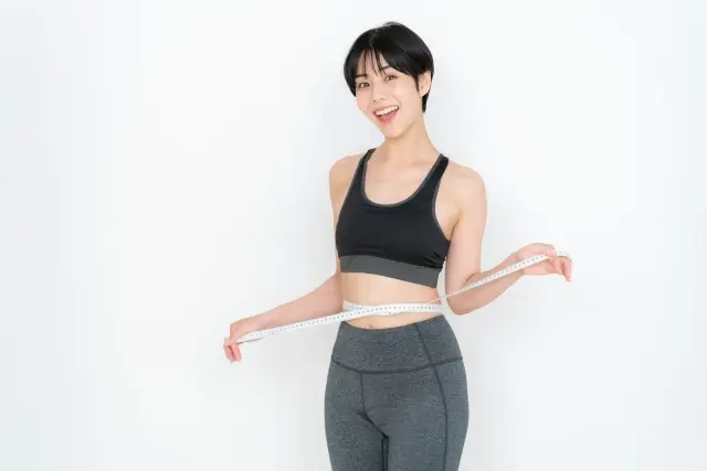 武蔵小山のジムで無理なく続いて、自分のダイエット結果に驚く女性
